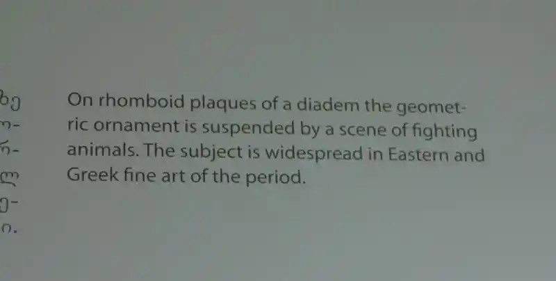 Gold diadem with scene of fighting animals